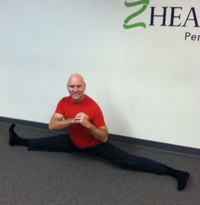 Jay Armstrong performing splits at Z-Health Headquarters in Phoenix, AZ